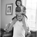 Photo of a Lincolnwood brother and sister playing around in their home on the far North Side of Chicago