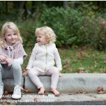 An example of a fall photo of two young sisters