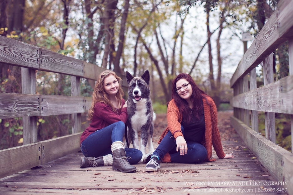 Photo of two girls with their dog