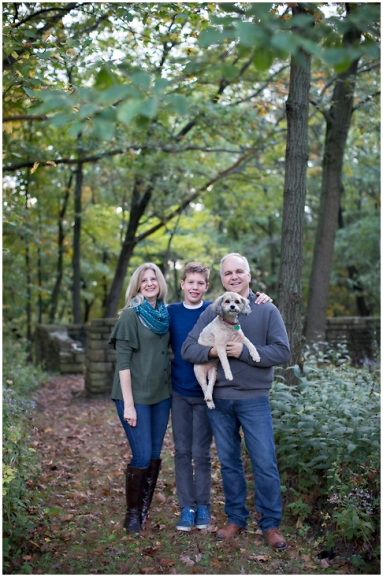 Photograph of a family in a forest setting