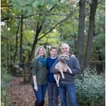 Photograph of a family in a forest setting