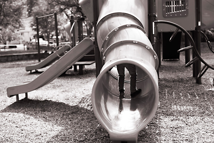 Photo of a boy playing in a playground in suburban Chicago
